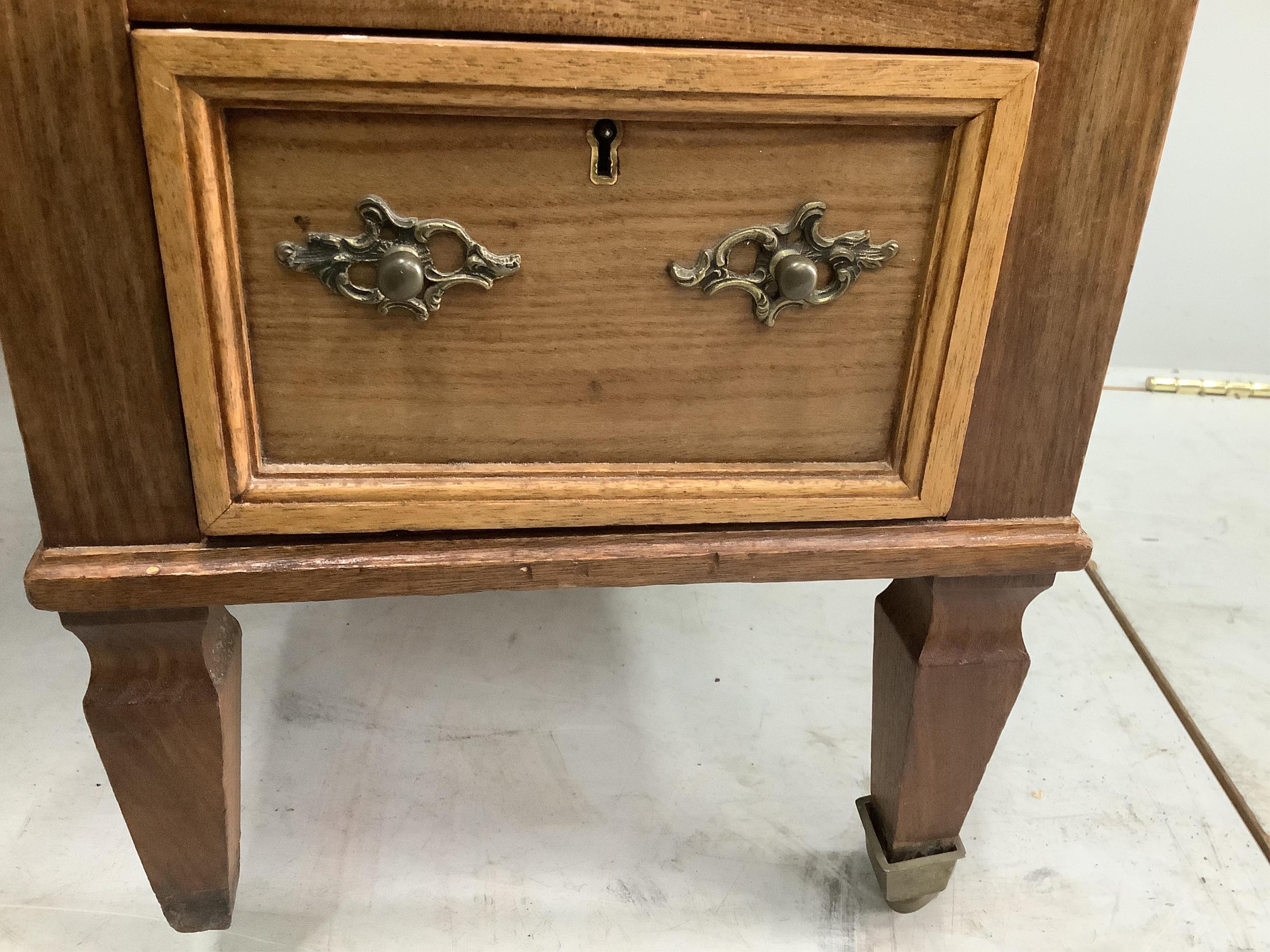 A late Victorian walnut nine drawer kneehole desk, missing two castors and one handle, width 112cm, depth 59cm, height 78cm. Condition - fair